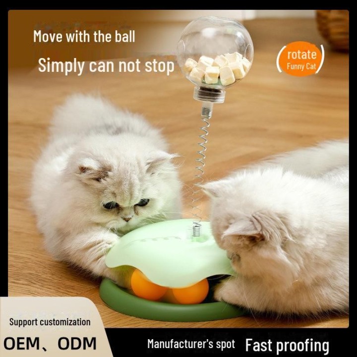 „Interaktives Katzen-Drehtellerspielzeug mit Federfutterball und Selbstunterhaltungsstab“ Sucker leaks food grün